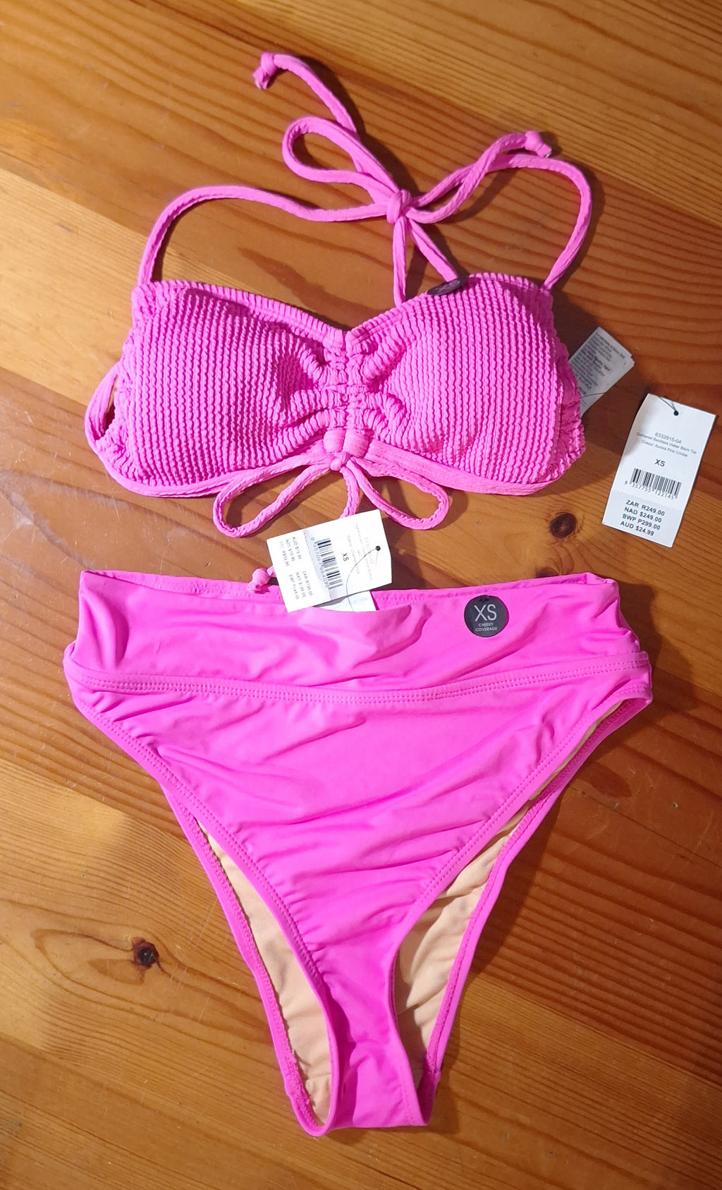Cotton On Bikini Set  Gathered Backless Halter Bikini Top. Colour: Aurora Pink Crinkle.  High-Waisted Cheeky Bikini Bottom. Colour: Charming Pink.