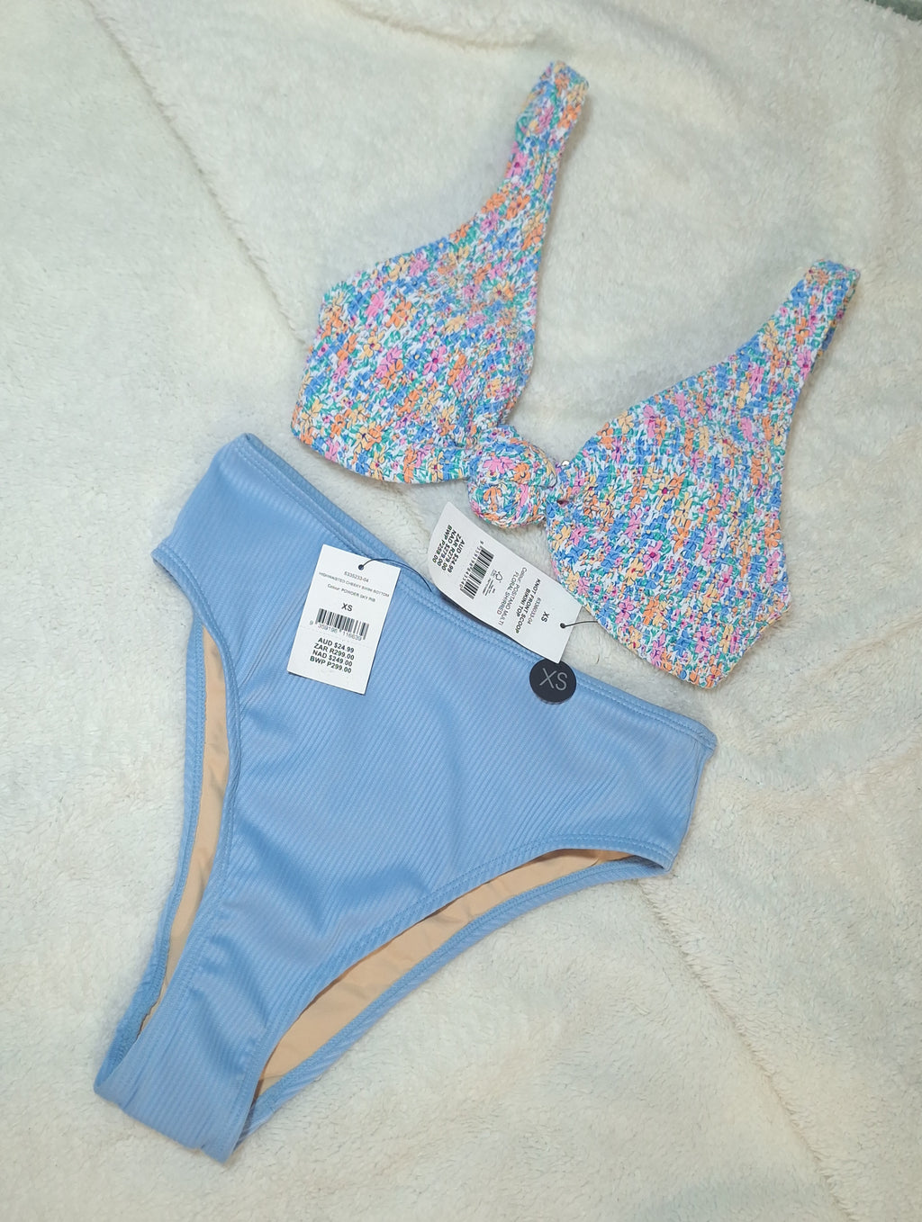 Cotton On Knot Front Scoop Bikini Top Colour: Positano Multi Floral Shirred .High-waisted Cheeky Bikini Bottom Colour: Powder Sky Rib