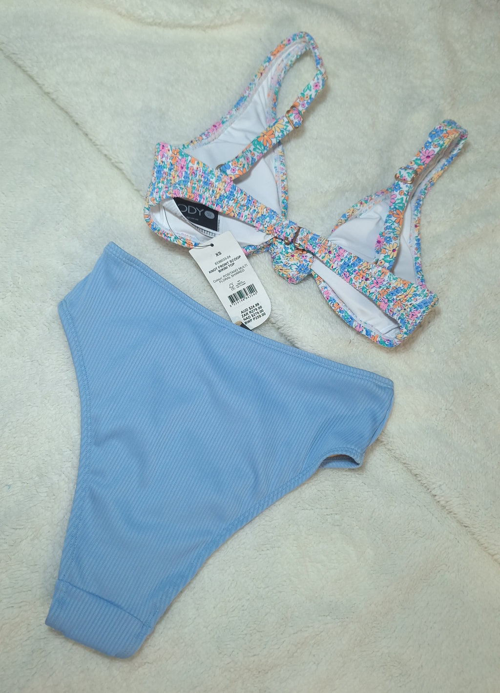 Cotton On Knot Front Scoop Bikini Top Colour: Positano Multi Floral Shirred .High-waisted Cheeky Bikini Bottom Colour: Powder Sky Rib